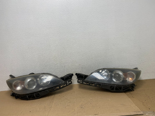 2004 to 2009 Mazda 3 Hatchback Left+Right Side Headlights AE6790 DW0
