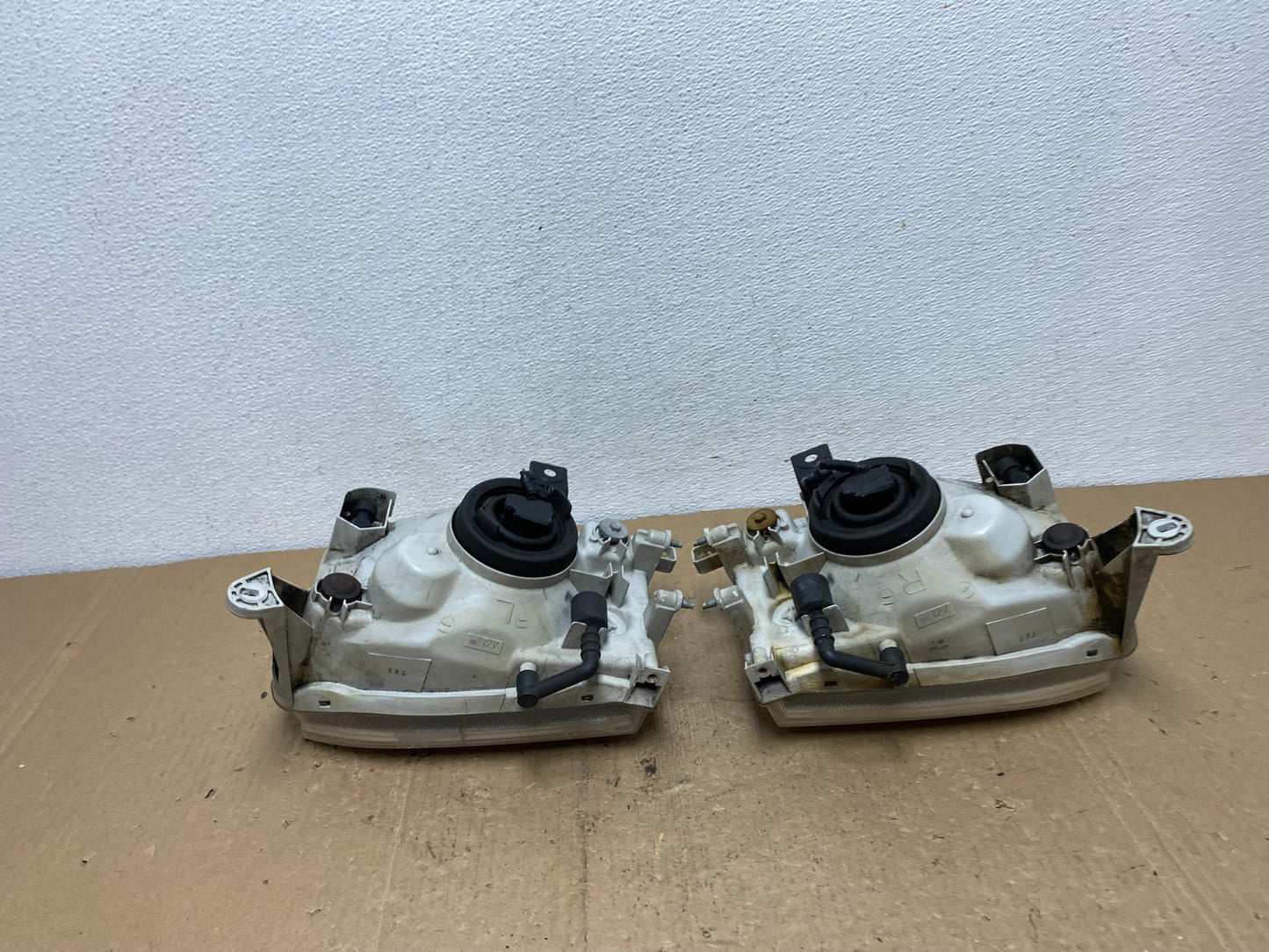 1999-2004 Nissan Pathfinder Left+Right Side Set Halogen Headlights AC6011 DW7