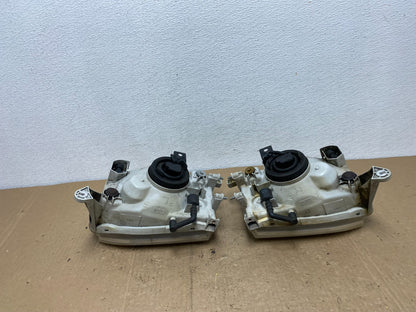 1999-2004 Nissan Pathfinder Left+Right Side Set Halogen Headlights AC6011 DW7
