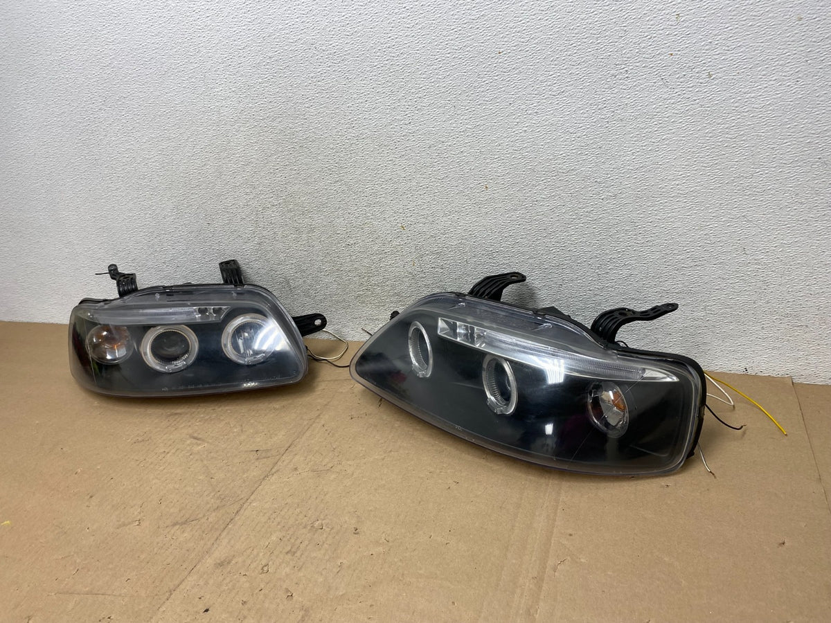 2004 to 2006 Chevrolet Aveo Sedan Aveo5 Left+Right Side Headlights AG46661