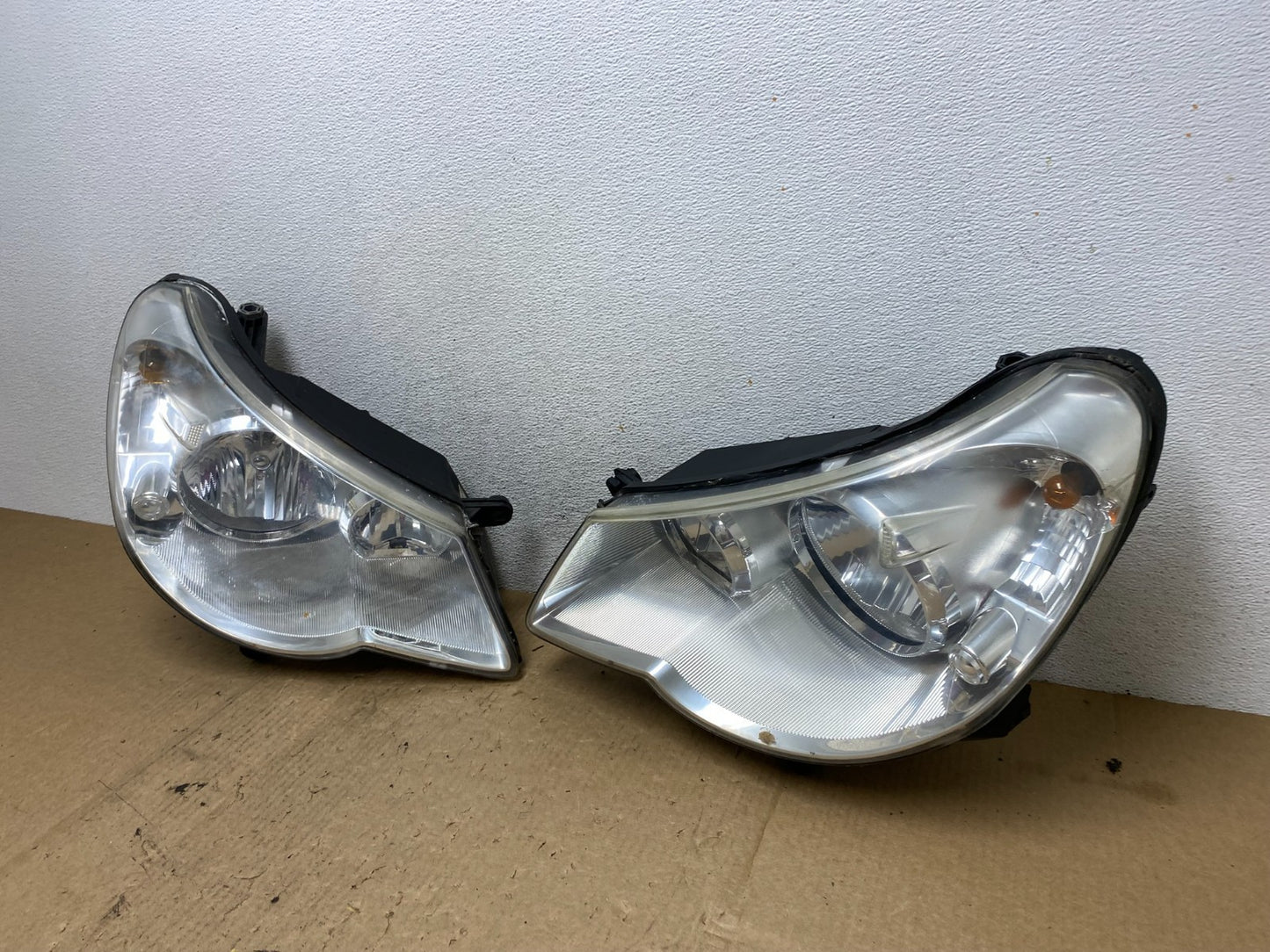 2007 to 2010 Chrysler Sebring Left+Right Side Headlights AF9867 DW1