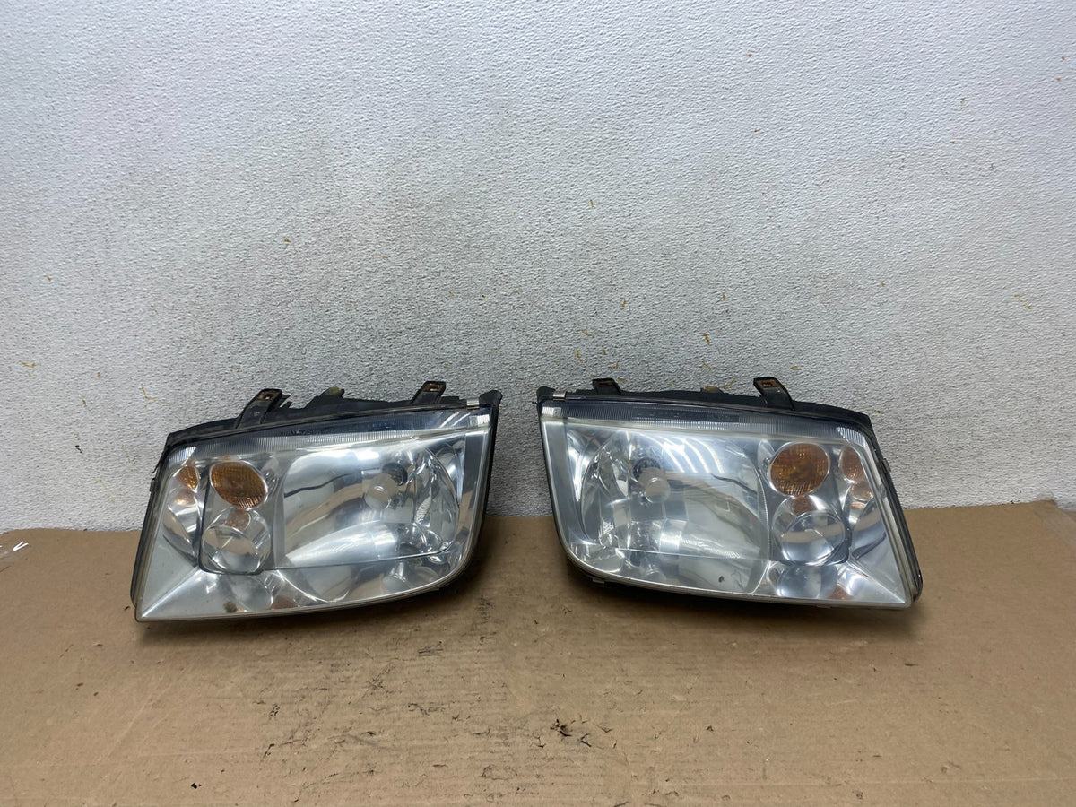 2002 to 2004 Volkswagen Jetta Left+Right Headlights AI0963 DW0