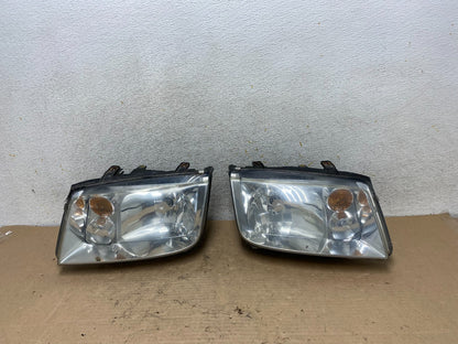 2002 to 2004 Volkswagen Jetta Left+Right Headlights AI0963 DW0