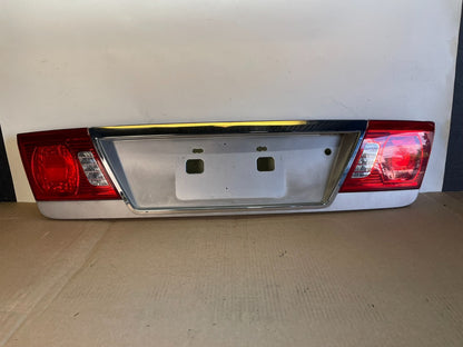 2003 to 2006 Kia Optima Rear License Plate Center Tail Light Panel AG3120 DG0