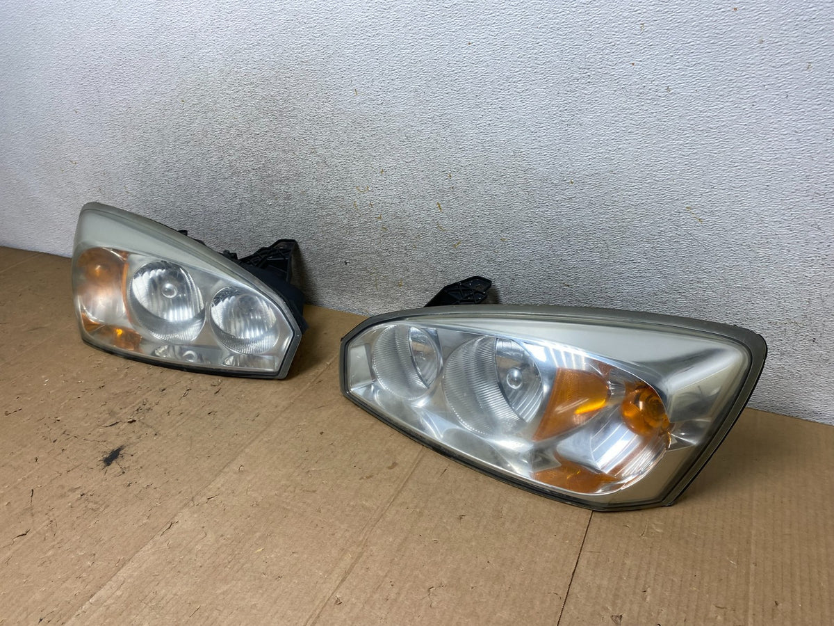 2004 to 2007 Chevrolet Malibu Left+Right Set Headlights AI9086 DW1