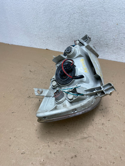 2003 to 2004 Toyota Corolla Left Driver LH side Headlight AG4409 DW11