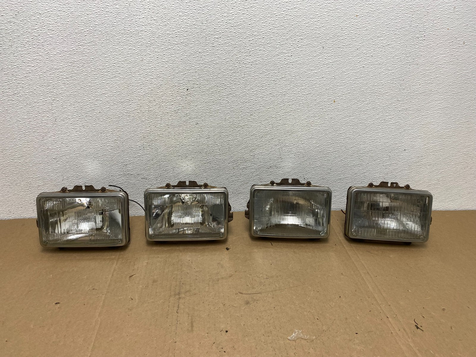 1984 to 1985 Pontiac Sunbird Left+Right Side Headlights AC56560