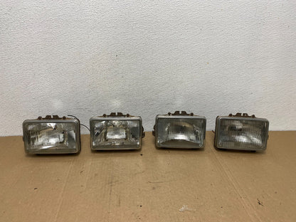 1984 to 1985 Pontiac Sunbird Left+Right Side Headlights AC56560