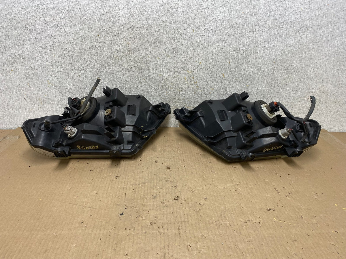 2008 to 2012 Nissan Pathfinder Halogen Headlights Left+Right AH5958 DW7