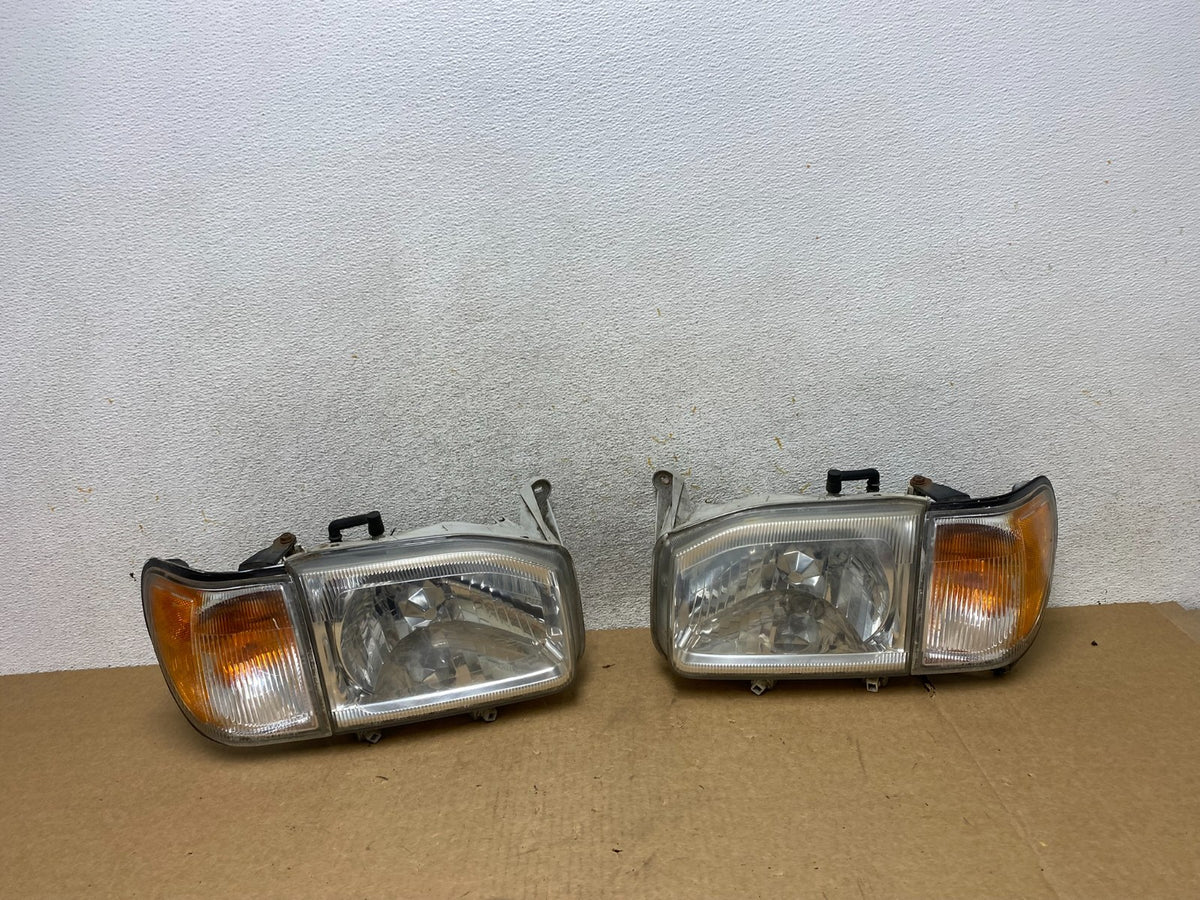 1999-2004 Nissan Pathfinder Left+Right Side Set Halogen Headlights AI2646 DW0