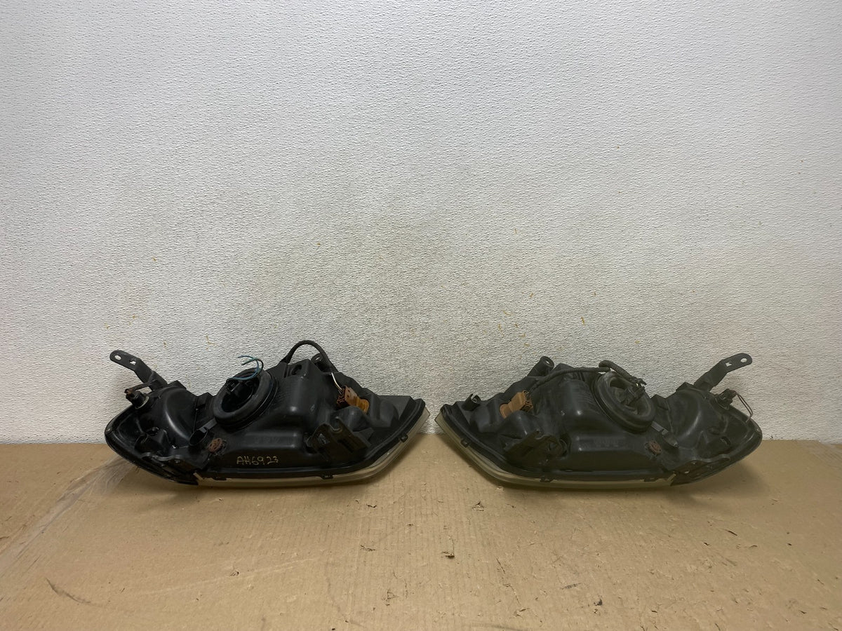 2005 to 2007 Mercury Mariner Left+Right Side Halogen Headlights AH6923 DW5