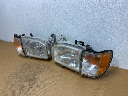 1999-2004 Nissan Pathfinder Left+Right Side Set Halogen Headlights AE1365 DW1