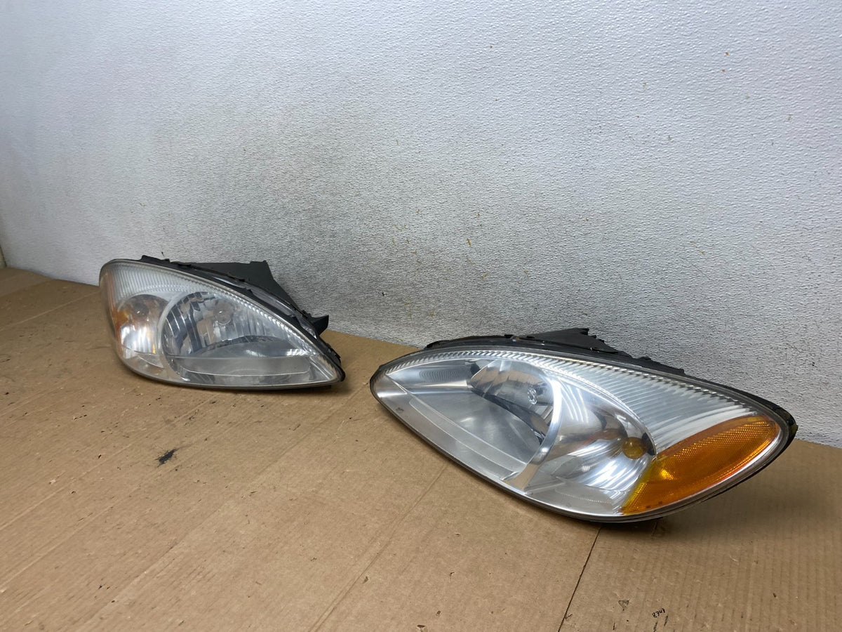 2000 to 2007 Ford Taurus Left+Right Side Halogen Headlights AI8873 DW1