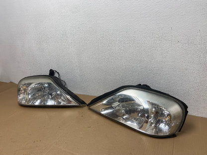 2000 to 2005 Mercury Sable Left+Right Side Set Halogen Headlights AB6122 DW1