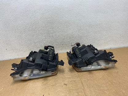 2005-2015 Nissan Xterra Driver Left+Right Side Set Headlights AI8164 DW6