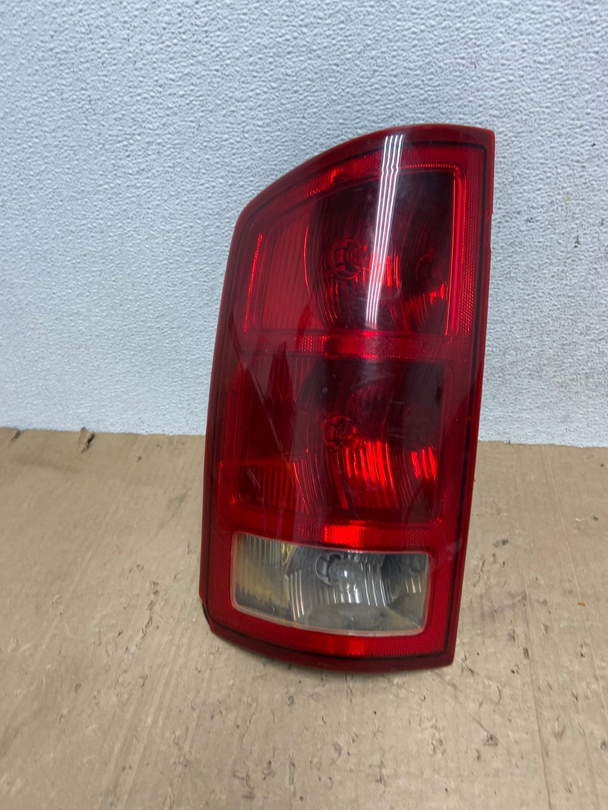 2002 to 2006 Dodge Ram 1500 Left Driver side Tail Light AE9299 LK0