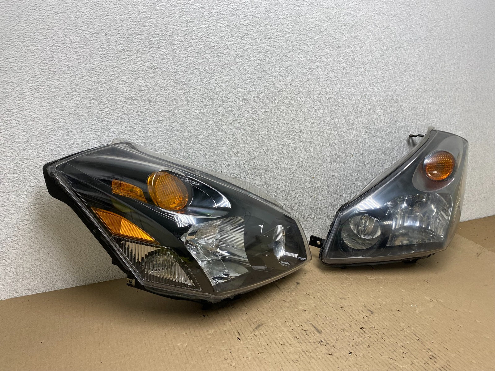 2004 to 2009 Nissan Quest Left+Right Side Black Headlights AE7101 DW2