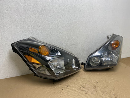 2004 to 2009 Nissan Quest Left+Right Side Black Headlights AE7101 DW2