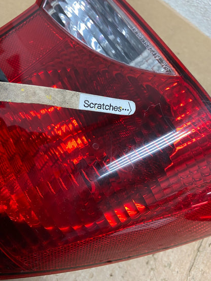 2000 to 2004 Ford Focus Left Driver Side Tail Light OEM AA52333