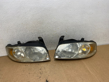 2004 - 2006 Nissan Sentra Halogen Left+Right Headlights AI8983 DW0