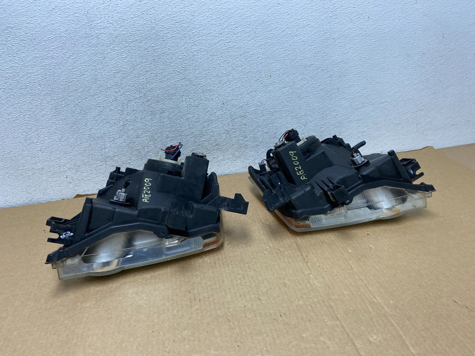 2005-2015 Nissan Xterra Driver Left+Right Side Set Headlights AG2009 DW9