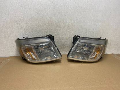 2008 to 2011 Mercury Mariner Left+Right Side Halogen Headlights AH4346 DW0