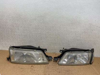 1995 to 1996 Nissan Maxima Left+Right Side Headlights Halogen OEM AA34860
