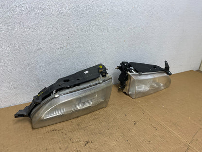 1993 to 1997 Toyota Corolla Left+Right Side Headlights AC7722 DW2