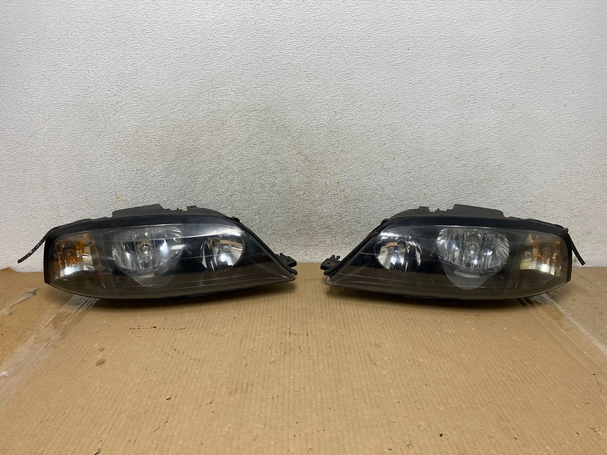 2003 to 2006 Lincoln Ls Left+Right Headlights Halogen AH3049 DW0