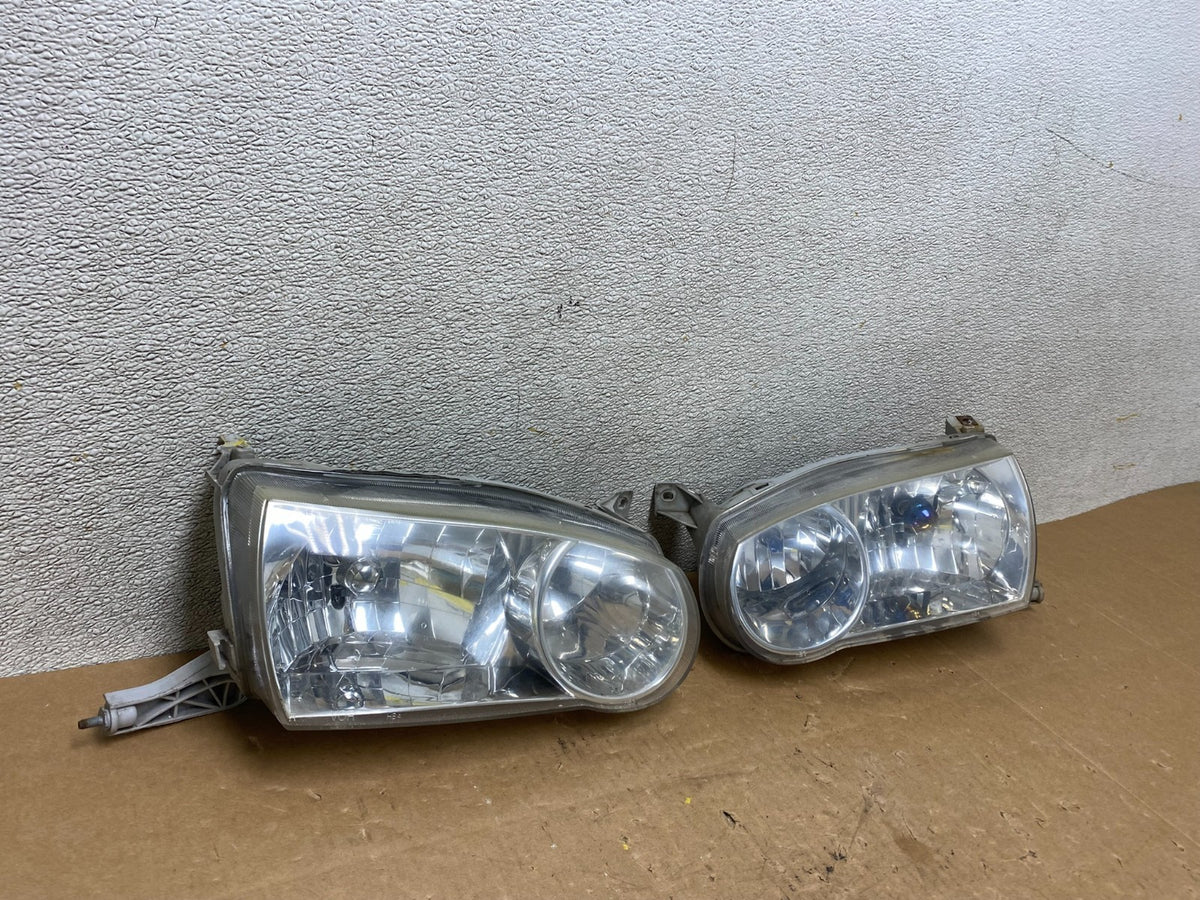 2001-2002 Toyota Corolla Left+Right Side Halogen Headlights V4977 DW2