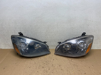 2005 to 2006 Nissan Altima Left+Right Side Set Halogen Headlights TYC T7936 DW0