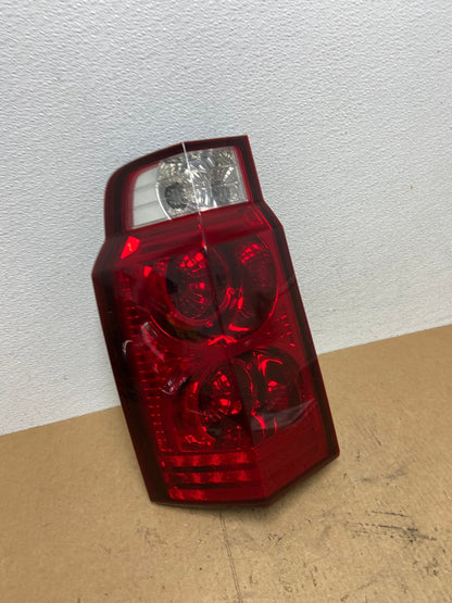 2006 to 2010 Jeep Commander Left Driver Side Tail Light OEM AC3526 LK2