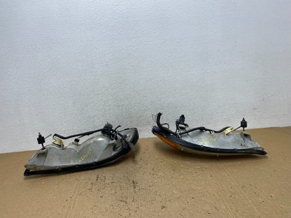 1999 to 2005 Pontiac Grand Am Left+Right Set Headlights AG1428 DW8