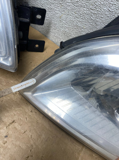 2007 to 2010 Kia Sportage Left+Right Halogen Headlights Oem V6250 DW8