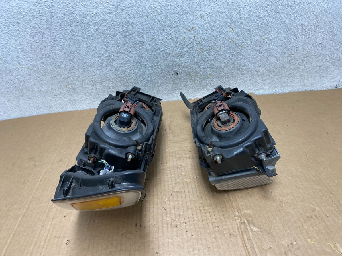 1993 to 1997 Toyota Corolla Left+Right Side Headlights AI4437 DW9