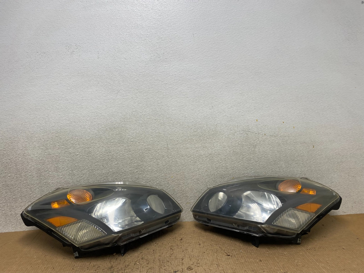 2004 to 2009 Nissan Quest Left+Right Side Black Headlights W8358 DW0