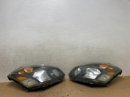 2004 to 2009 Nissan Quest Left+Right Side Black Headlights W8358 DW0