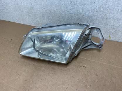 1999 to 2000 Mazda Protege Left Driver LH Side Headlight OEM M3848 DG1