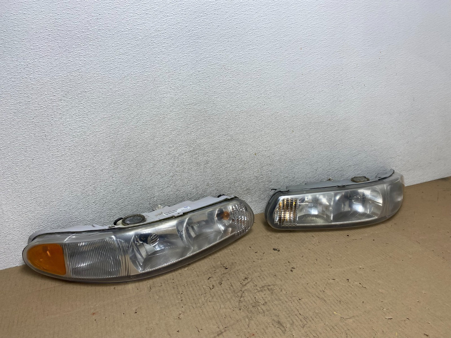 1997-2005 Buick Century Left+Right Side Headlights Halogen AG6531 DW2