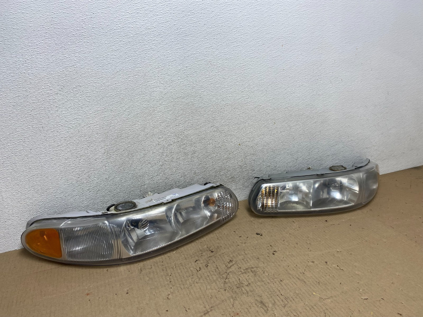 1997-2005 Buick Century Left+Right Side Headlights Halogen AG6531 DW2