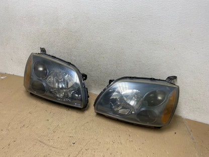 2004 to 2009 Mitsubishi Galant Left+Right Headlights Halogen AH7650 DW2