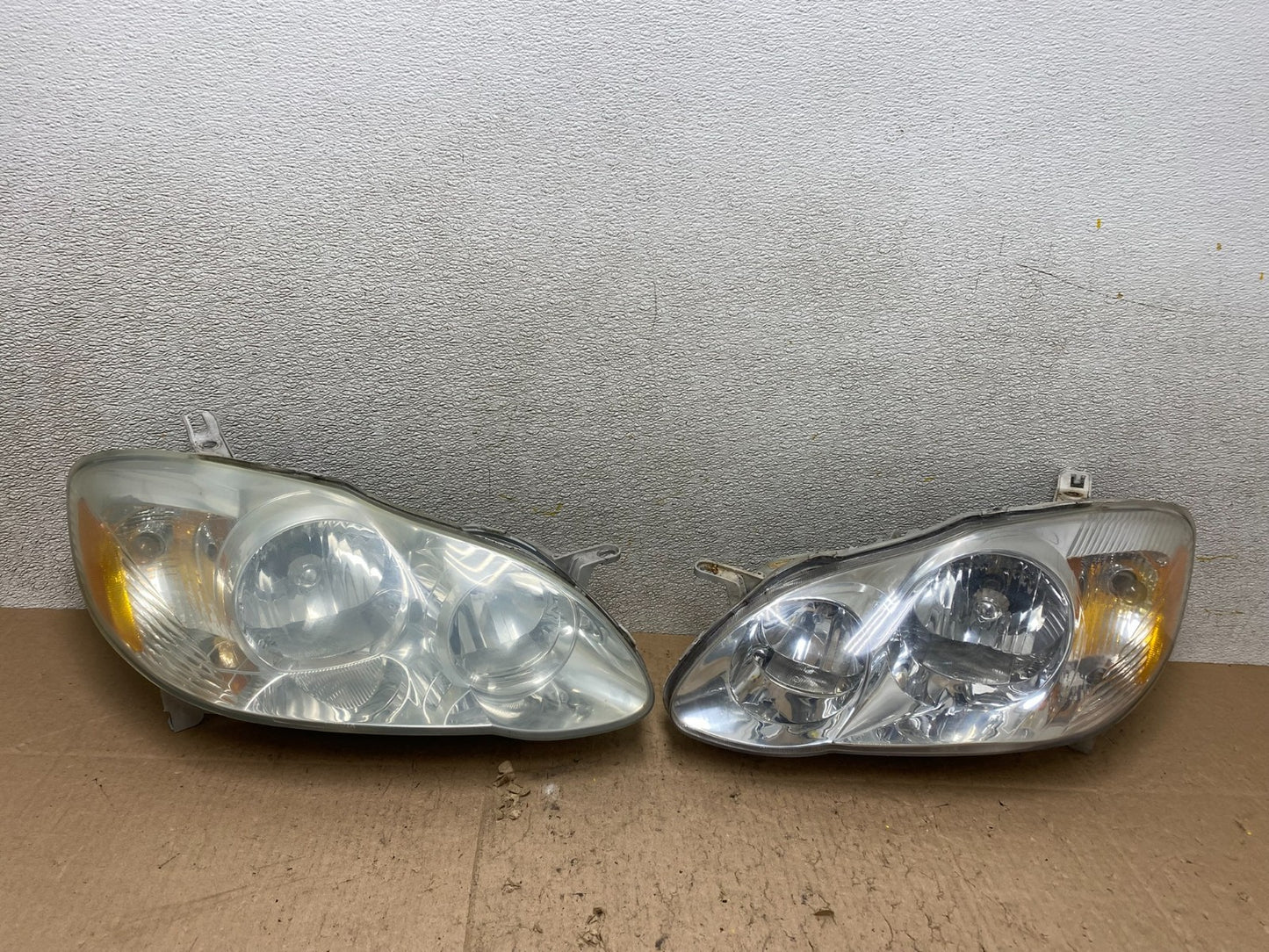 2003 to 2004 Toyota Corolla Left+Right Side Set Headlights W2743 DW0