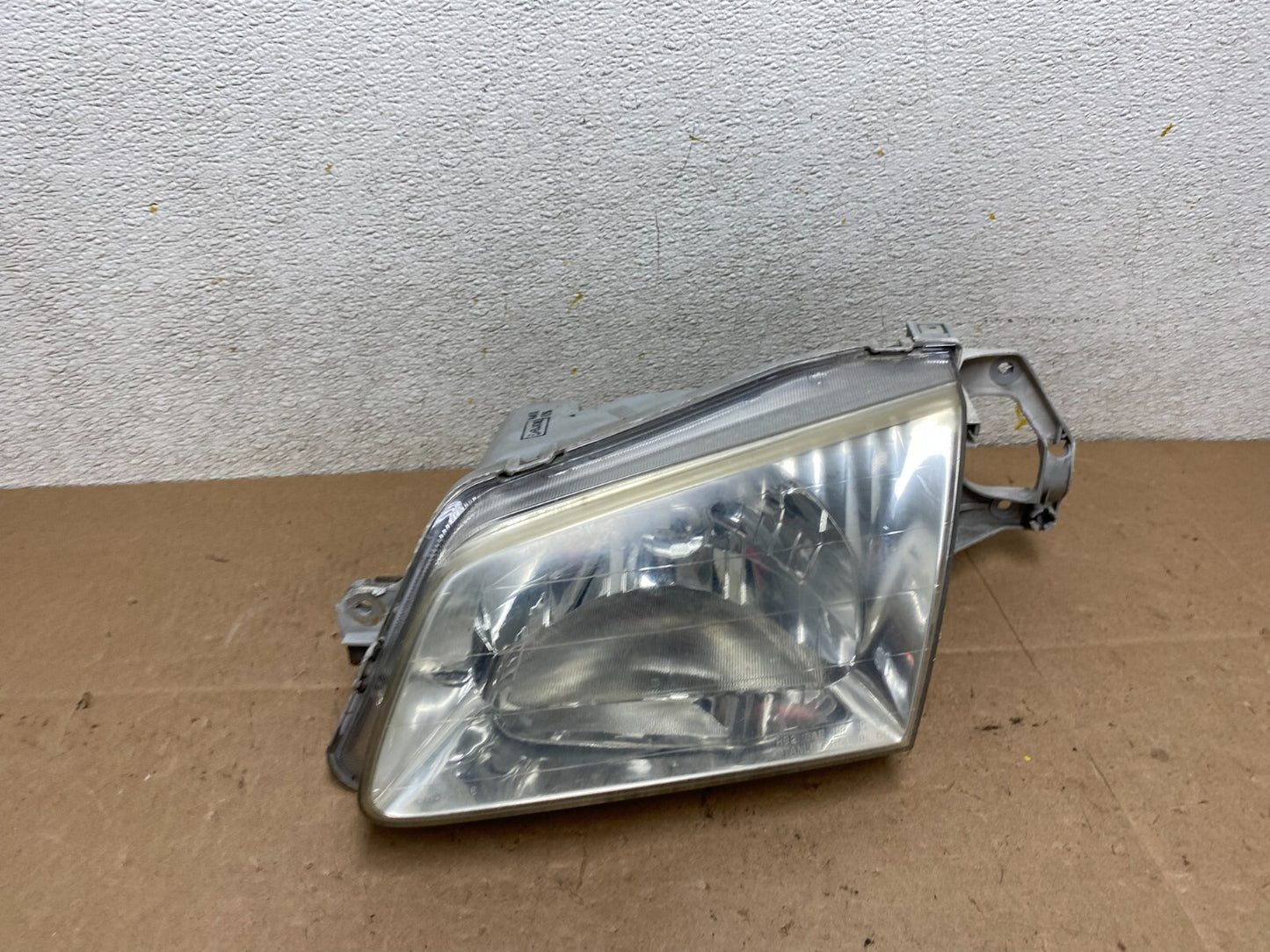 1999 to 2000 Mazda Protege Left Driver LH Side Headlight OEM M3848 DG0