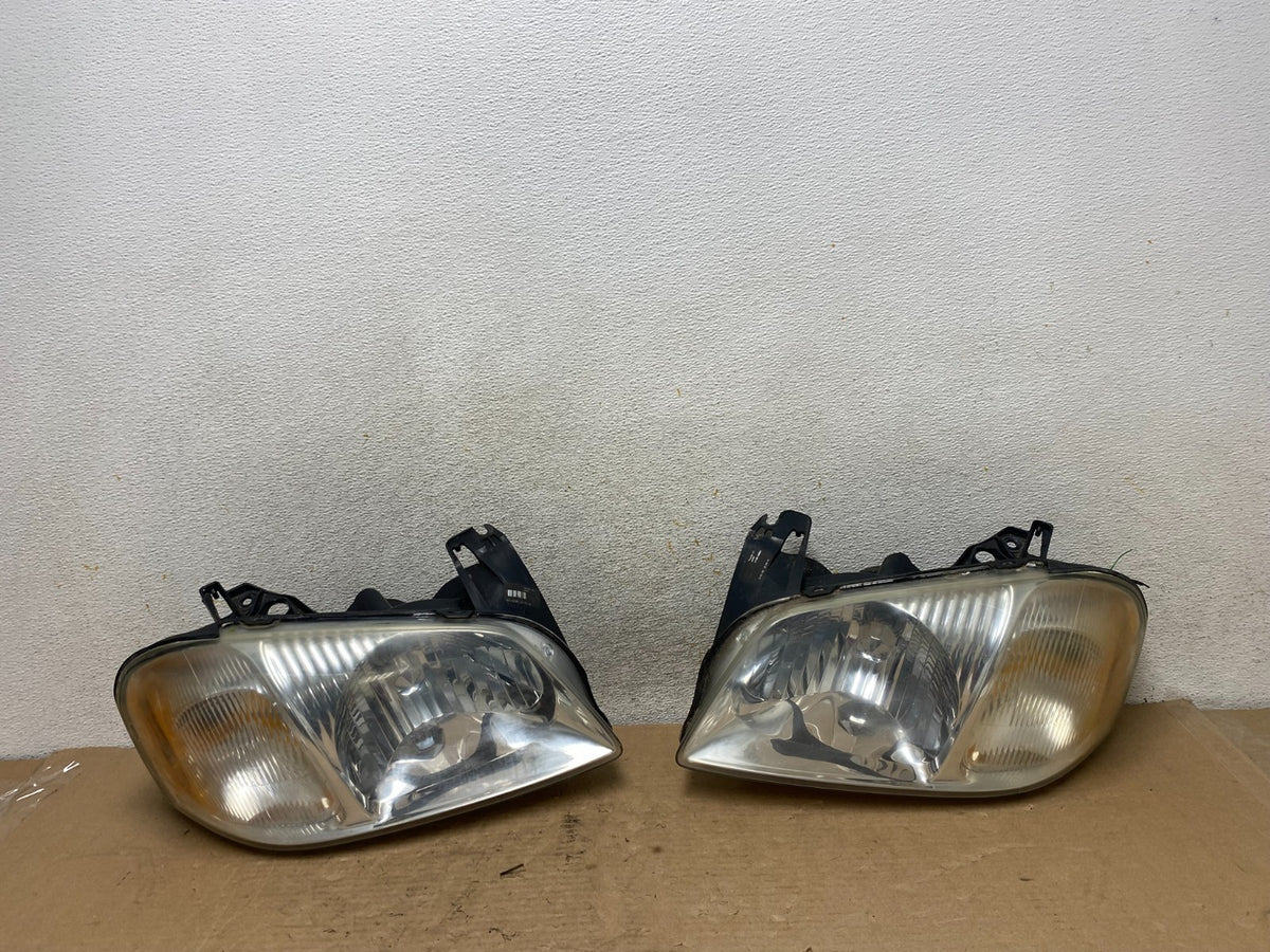 2001 2002 2003 2004 Mazda Tribute Left+Right Side Set Headlights AI0905 DW0