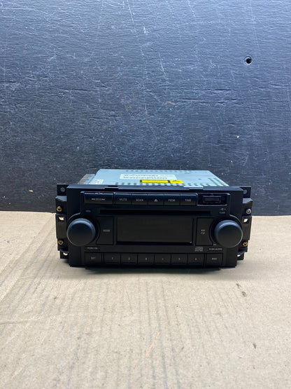 2005-2009 Chrysler Dodge Jeep Ram Radio CD MP3 AUX Receiver AJ0076 DW1