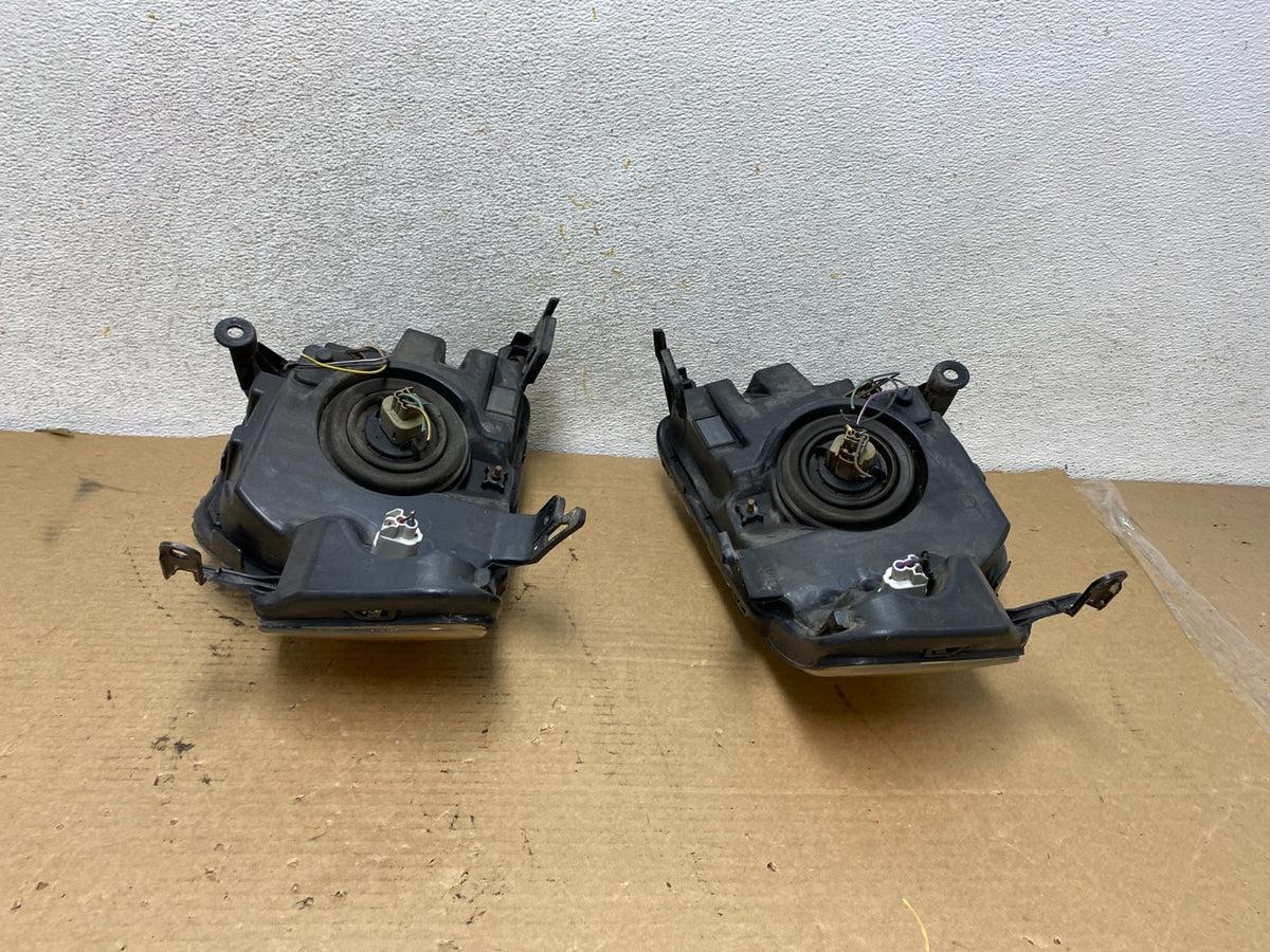 2008 to 2012 Ford Escape Headlights Left+Right Side Set Halogen AH4200 DW10
