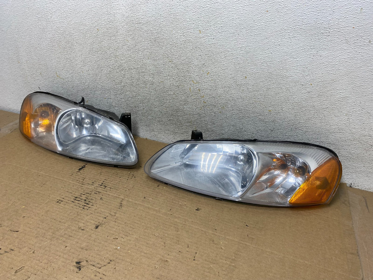 2001 to 2002 Chrysler Sebring Left+Right Set Headlight AH4141 DG2