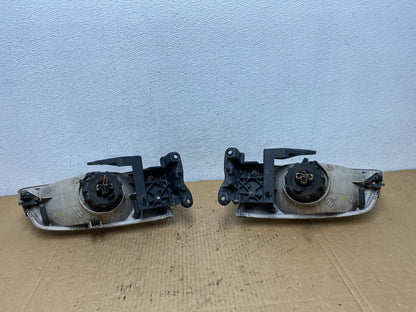 2000 to 2002 Mazda 626 Left+Right Side Headlights AD1087 DW8