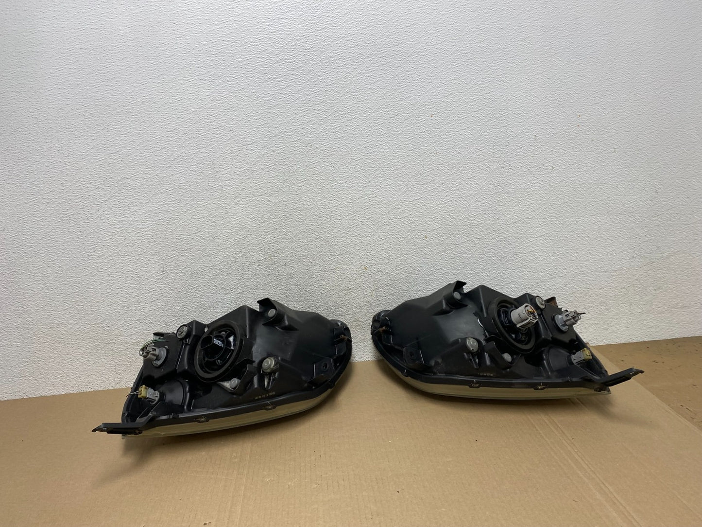 2004 - 2009 Mitsubishi Galant Left+Right Headlights Halogen AF5769 DW7