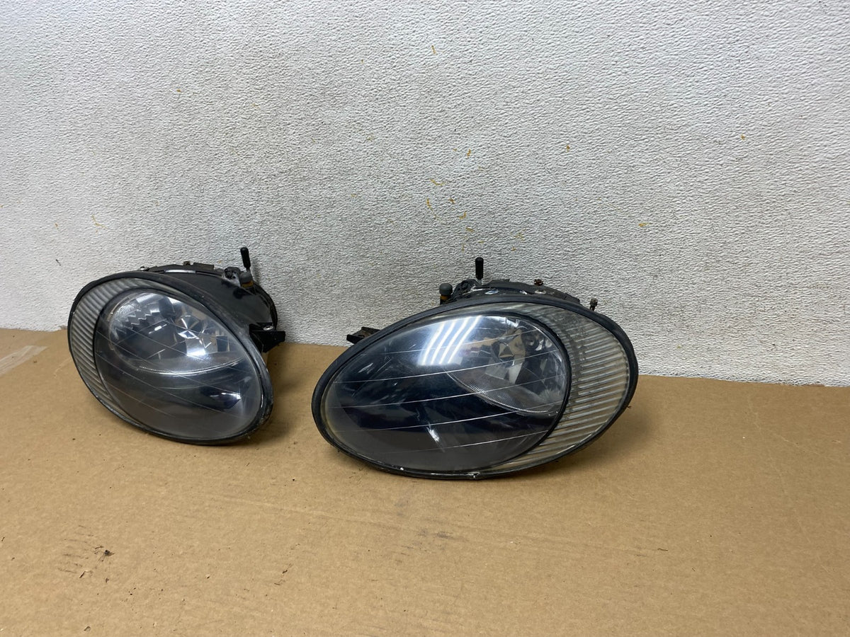 1996 to 1999 Ford Taurus Left+Right Side Headlights AH4413 DW2